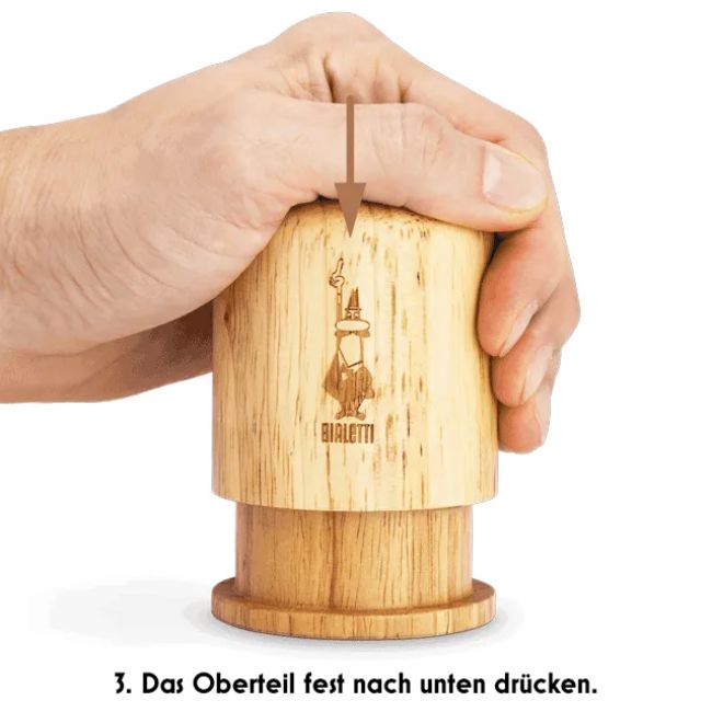 Das Oberteil fest nach unten drücken